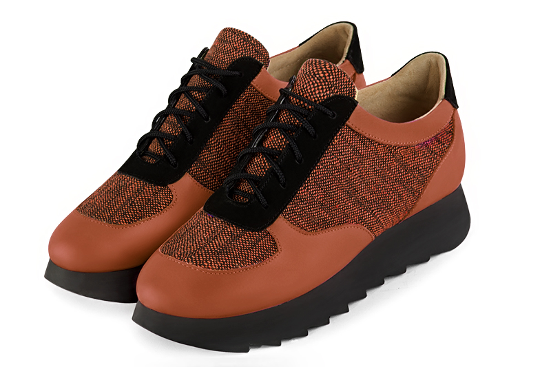Terracotta orange and matt black women's two-tone elegant sneakers. Round toe. Low rubber soles. Front view - Florence KOOIJMAN